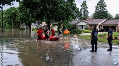 First responders rescue people from flooding in their homes on August 10, 2025 in Wauwatosa, Wisconsin. (Getty Images via AFP) First responders rescue people from flooding in their homes on August 10, 2025 in Wauwatosa, Wisconsin. (Getty Images via AFP)