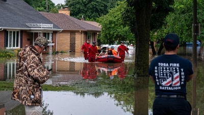 Residents have been advised to report any roadway flooding, water backing up into basements, fallen trees or limbs, stuck or immobilized vehicles, and flooded areas. They should also refrain from walking or driving through standing water. (Getty Images via AFP) Residents have been advised to report any roadway flooding, water backing up into basements, fallen trees or limbs, stuck or immobilized vehicles, and flooded areas. They should also refrain from walking or driving through standing water. (Getty Images via AFP)