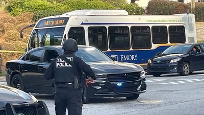 Atlanta Police lock down the streets around the Center for Disease Control (CDC) during an active shooter event in Atlanta, Georgia on August 8, 2025. (AFP)