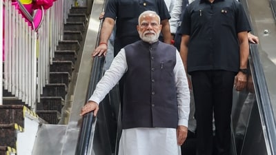 Prime Minister Narendra Modi interacts with students during the flag-off ceremony of the Yellow Line of Namma Metro, in Bengaluru. (DPR PMO) Prime Minister Narendra Modi interacts with students during the flag-off ceremony of the Yellow Line of Namma Metro, in Bengaluru. (DPR PMO)