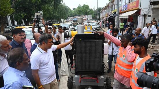PWD Minister Parvesh Verma visited the waterlogging-affected site and reviewed the situation on the ground at Outer Circle, Connaught Place, in New Delhi on Sunday. (Vipin Kumar/ Hindustan Times)