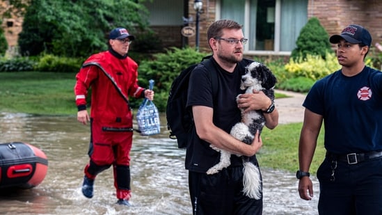 Flash flooding in Wisconsin due to excessive rains resulted in flooded basements, flooded roadways, and an early closing of the state fair.&nbsp;(Getty Images via AFP)