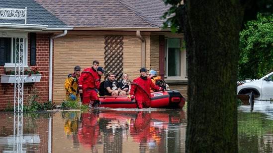 Heavy downpours brought as much as 13 inches of rain to parts of southeast Wisconsin overnight, resulting in widespread flooding across the region.&nbsp;(Getty Images via AFP)