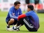 India head coach Gautam Gambhir speaks to Shubman Gill during practice.