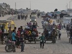 Displaced Palestinians travel on carts and vehicles through a makeshift camp along the beach in Gaza City, Sunday, Aug. 10, 2025. Displaced Palestinians travel on carts and vehicles through a makeshift camp along the beach in Gaza City, Sunday, Aug. 10, 2025.