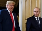 US President Donald Trump (L) and Russian President Vladimir Putin arrive for a meeting in Helsinki on July 16, 2018. 