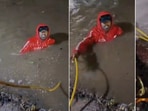 Locals rescue Zomato delivery rider Syed Farhan after he fell into an open drain during heavy rains near TKR Kaman in Hyderabad on August 9. Locals rescue Zomato delivery rider Syed Farhan after he fell into an open drain during heavy rains near TKR Kaman in Hyderabad on August 9.