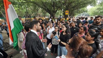 Activists protesting against the SC’s order outside the India Gate on Monday. (HT Photo) Activists protesting against the SC’s order outside the India Gate on Monday. (HT Photo)