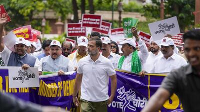 LoP in the Lok Sabha and Congress leader Rahul Gandhi and other Opposition leaders during a protest march from Parliament House to the Election Commission in New Delhi on Monday. (PTI) LoP in the Lok Sabha and Congress leader Rahul Gandhi and other Opposition leaders during a protest march from Parliament House to the Election Commission in New Delhi on Monday. (PTI)