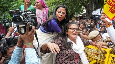 TMC MPs Sushmita Dev, Mahua Moitra protested with others during a protest march by the INDIA bloc MPs from the Makar Dwar of Parliament. (PTI) TMC MPs Sushmita Dev, Mahua Moitra protested with others during a protest march by the INDIA bloc MPs from the Makar Dwar of Parliament. (PTI)