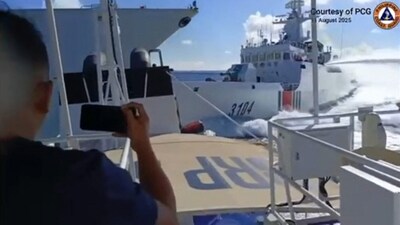 This handout video grab released and taken on August 11, 2025 by the Philippine Coast Guard shows an incident between a Chinese Navy vessel (L) and a Chinese Coast Guard ship (R) as seen from a Philippine fisheries boat near Scarborough Shoal in the disputed South China Sea. (AFP) This handout video grab released and taken on August 11, 2025 by the Philippine Coast Guard shows an incident between a Chinese Navy vessel (L) and a Chinese Coast Guard ship (R) as seen from a Philippine fisheries boat near Scarborough Shoal in the disputed South China Sea. (AFP)