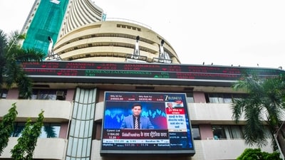 A man walks past the Bombay Stock Exchange (BSE) building, in Mumbai. (PTI) A man walks past the Bombay Stock Exchange (BSE) building, in Mumbai. (PTI)