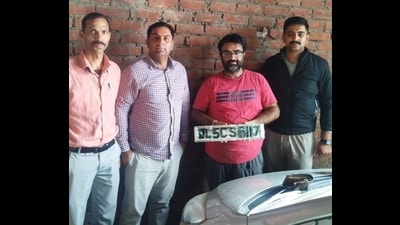 The accused (red T-shirt) in police custody in Shimla on Monday. (HT Photo) The accused (red T-shirt) in police custody in Shimla on Monday. (HT Photo)
