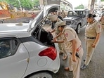 Cops during a vehicle checking drive in Ludhiana on Tuesday. (Gurpreet Singh/HT) Cops during a vehicle checking drive in Ludhiana on Tuesday. (Gurpreet Singh/HT)