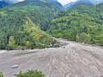 Mud and debris after the August 5 flash floods in Uttarkashi. (PTI) Mud and debris after the August 5 flash floods in Uttarkashi. (PTI)