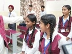 Punjab CM Bhagwant Mann interacting with students at the newly inaugurated School of Eminence in Sangrur on Monday. (HT) Punjab CM Bhagwant Mann interacting with students at the newly inaugurated School of Eminence in Sangrur on Monday. (HT)