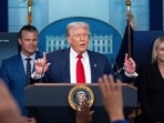 President Donald Trump speaks with reporters in the James Brady Press Briefing Room at the White House, Monday, Aug. 11, 2025, in Washington, as Secretary of Defense Pete Hegseth and Attorney General Pam Bondi look on. (AP Photo/Alex Brandon)