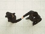 Realistic AI-enabled videos are one reason some companies are relying more on old-fashioned, face-to-face job interviews.