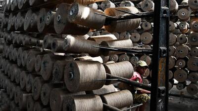 (FILES) On May 17, India restricted imports of ready-made garments from Bangladesh to only Kolkata and Nhava Sheva ports. (AFP FILE/Representative Image) (FILES) On May 17, India restricted imports of ready-made garments from Bangladesh to only Kolkata and Nhava Sheva ports. (AFP FILE/Representative Image)