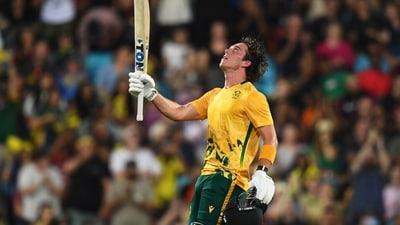 Dewald Brevis of South Africa celebrates after scoring a century during the T20 international cricket match between Australia and South Africa (AP)