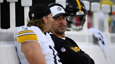 Pittsburgh Steelers quarterback Aaron Rodgers talks with wide receiver Ben Skowronek (AP) Pittsburgh Steelers quarterback Aaron Rodgers talks with wide receiver Ben Skowronek (AP)