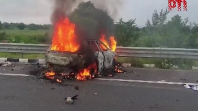 Emergency services also rushed to the scene, and the fire brigade managed to douse the flames from the vehicle. (PTI) Emergency services also rushed to the scene, and the fire brigade managed to douse the flames from the vehicle. (PTI)