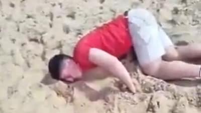 A British tourist was filmed collapsing on a beach in Brazil after allegedly being drugged. A British tourist was filmed collapsing on a beach in Brazil after allegedly being drugged.