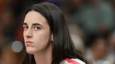 Caitlin Clark #22 of the Indiana Fever watches from the bench during the first half of the WNBA game against the Phoenix Mercury (Getty Images via AFP) Caitlin Clark #22 of the Indiana Fever watches from the bench during the first half of the WNBA game against the Phoenix Mercury (Getty Images via AFP)