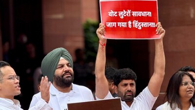 Members of the INDIA bloc hold placards that read ‘Vote looteron savdhan! Jag gaya hai Hindustan’ (Vote stealers beware, Hindustan has awakened), as they protest over 'poll fraud' issues during today's parliament session. (Instagram/@incindia) Members of the INDIA bloc hold placards that read ‘Vote looteron savdhan! Jag gaya hai Hindustan’ (Vote stealers beware, Hindustan has awakened), as they protest over 'poll fraud' issues during today's parliament session. (Instagram/@incindia)