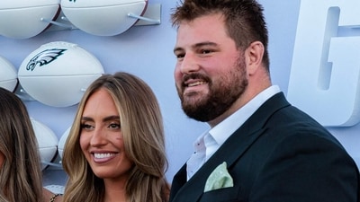 Brooke Dickerson and Landon Dickerson pose for photographs on the Green Carpet during the Philadelphia Eagles Super Bowl ring ceremony. (Getty Images via AFP) Brooke Dickerson and Landon Dickerson pose for photographs on the Green Carpet during the Philadelphia Eagles Super Bowl ring ceremony. (Getty Images via AFP)
