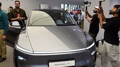 Tesla has launched its second India showroom, an 8,200 sq ft space at Worldmark 3 in Delhi’s Aerocity. (Photo for representational purposes only) (Photographer: Prakash Singh/Bloomberg) (Bloomberg)