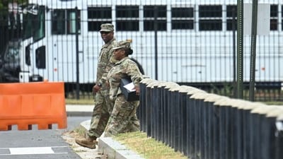 Members of the National Guard arrive at the DC Armory in Washington, DC, on August 12, 2025 where troops were given orders to report on Tuesday morning according to media reports. (AFP) Members of the National Guard arrive at the DC Armory in Washington, DC, on August 12, 2025 where troops were given orders to report on Tuesday morning according to media reports. (AFP)