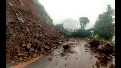 Uprooted trees and debris block the Kotranka-Khawas road after a landslide at Kanja, in Rajouri district on Tuesday. (PTI) Uprooted trees and debris block the Kotranka-Khawas road after a landslide at Kanja, in Rajouri district on Tuesday. (PTI)