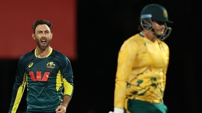Glenn Maxwell, left, gives a send off to Lhuan-dre Pretorius (AFP) Glenn Maxwell, left, gives a send off to Lhuan-dre Pretorius (AFP)