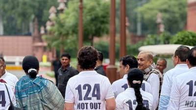 Priyanka Gandhi Vadra and other INDIA bloc members protest at today's Parliament session wear t-shirts that read ‘124 NOT OUT’ after a voter allegedly listed as 124 years was seen on the electoral roll. (Instagram/ @incindia) Priyanka Gandhi Vadra and other INDIA bloc members protest at today's Parliament session wear t-shirts that read ‘124 NOT OUT’ after a voter allegedly listed as 124 years was seen on the electoral roll. (Instagram/ @incindia)