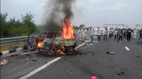 The car went up in flames in Alwar after the accident on Tuesday. (HT Photo)