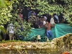 A Special Investigation Team (SIT) examining the site in the Dharmasthala mass burial case in Dakshina Kannada district of Karnataka. (PTI FILE PHOTO) A Special Investigation Team (SIT) examining the site in the Dharmasthala mass burial case in Dakshina Kannada district of Karnataka. (PTI FILE PHOTO)