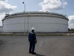 A worker stands at the oil tank terminal of the state-run company MERO, which transports crude oil and protects the strategic crude oil reserves of the Czech Republic, on June 17, 2025 in Nelahozeves, near Kralupy nad Vltavou. The Czech Republic has phased out Russian oil in a painstaking process taking much longer than the three years since Russia's invasion of Ukraine, its mastermind Jaroslav Pantucek, CEO and board chairman of Mero said. (Photo by Michal Cizek / AFP) A worker stands at the oil tank terminal of the state-run company MERO, which transports crude oil and protects the strategic crude oil reserves of the Czech Republic, on June 17, 2025 in Nelahozeves, near Kralupy nad Vltavou. The Czech Republic has phased out Russian oil in a painstaking process taking much longer than the three years since Russia's invasion of Ukraine, its mastermind Jaroslav Pantucek, CEO and board chairman of Mero said. (Photo by Michal Cizek / AFP)