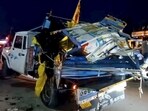 Twenty people were on board the pickup vehicle when it rammed into a stationary truck in the service lane of the highway