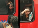 Girl struggles to breathe in an overcrowded train, tries to open the window, and splashes water.