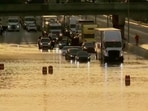 Chattanooga flooding: Traffic moves through a flooded road in Chattanooga, Tenn., Tuesday, Aug. 12, 2025. (WTVC via AP) Chattanooga flooding: Traffic moves through a flooded road in Chattanooga, Tenn., Tuesday, Aug. 12, 2025. (WTVC via AP)