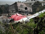 Debris of Air India flight 171 is pictured after it crashed in a residential area near the airport in Ahmedabad.