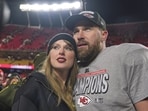 Kansas City Chiefs tight end Travis Kelce, right, appears with singer Taylor Swift after the Chiefs victory over the Buffalo Bills 