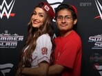 Nikki Bella, with a fan, Brian Lema