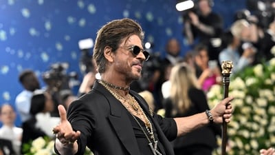 You guessed it right! This is Shah Rukh Khan during his Met Gala debut in May this year. He struck his signature pose on the blue carpet ahead of the opening of the "Superfine: Tailoring Black Style" exhibition. AP/PTI (AP) You guessed it right! This is Shah Rukh Khan during his Met Gala debut in May this year. He struck his signature pose on the blue carpet ahead of the opening of the "Superfine: Tailoring Black Style" exhibition. AP/PTI (AP)