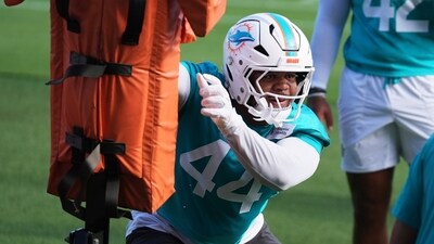 Miami Dolphins linebacker Chop Robinson (44) does drills during practice (AP)