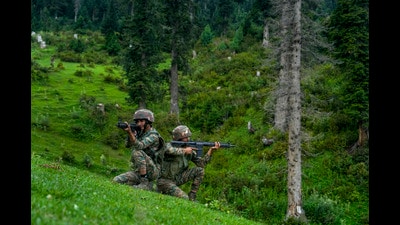 Indian Army jawans keep watch near the Line of Control in Uri sector of Baramulla district. (PTI) Indian Army jawans keep watch near the Line of Control in Uri sector of Baramulla district. (PTI)