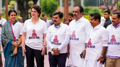 Congress MP Priyanka Gandhi Vadra and other INDIA bloc members seen wearing T-shirts featuring the name Minta Devi, a voter allegedly listed as 124 years old in the Election Commission's voter list, during their protest over the issues of 'poll fraud' and Special Intensive Revision of electoral rolls. (PTI ) Congress MP Priyanka Gandhi Vadra and other INDIA bloc members seen wearing T-shirts featuring the name Minta Devi, a voter allegedly listed as 124 years old in the Election Commission's voter list, during their protest over the issues of 'poll fraud' and Special Intensive Revision of electoral rolls. (PTI )