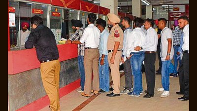 Postal staff say they are struggling with parcel bookings, money order payments, and invoice-related work. (Manish/HT) Postal staff say they are struggling with parcel bookings, money order payments, and invoice-related work. (Manish/HT)