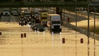 Chattanooga flooding: Traffic moves through a flooded road in Chattanooga, Tenn., Tuesday, Aug. 12, 2025. (WTVC via AP) (AP) Chattanooga flooding: Traffic moves through a flooded road in Chattanooga, Tenn., Tuesday, Aug. 12, 2025. (WTVC via AP) (AP)